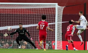 Mateusz Klich scores his side’s third goal at Liverpool in Leeds’s opening game