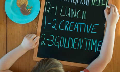 Child with a blackboard with their daily work schedule on it