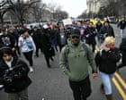 Dozens of January 6 supporters march through Washington five years after attack; brawl erupts as counter-protester is arrested – live
