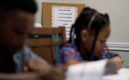 children sit side by side with a list of “homeschool rules” in the background