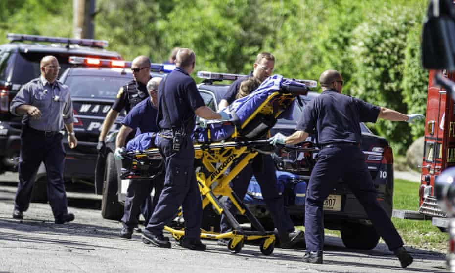 Rescue workers take 12-year-old stabbing victim Payton Leutner to an ambulance in Waukesha, Wisconsin, on 31 May 2014, after allegedly she was attacked by two classmates.