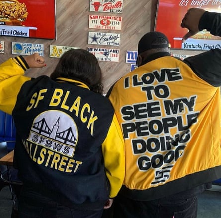 Two local residents showing off their San Francisco Black Wallstreet jackets.