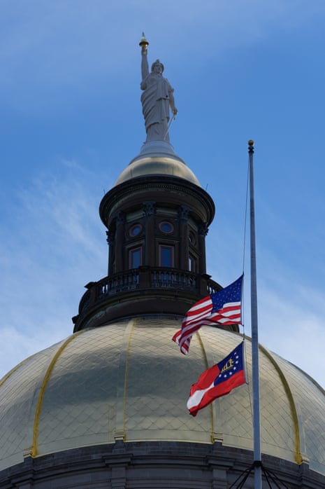 Biden calls Jimmy Carter ‘a statesman and a humanitarian’ as funeral details announced – latest updates Flags fly at half staff over the Capitol Building in honor of Carter.