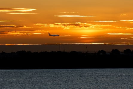 A plane prepares to land at Sydney airport