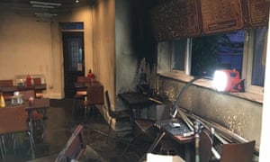 The interior of JS Restaurant in north Manchester following an arson attack.