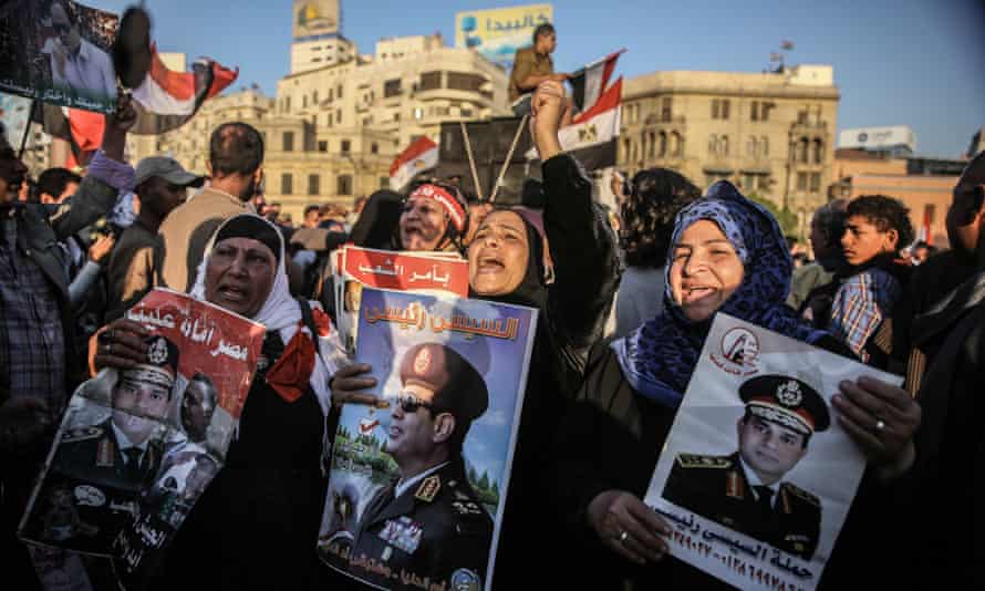 Protesters in Cairo call on Abdel Fattah el Sisi to run for president, March 2014.