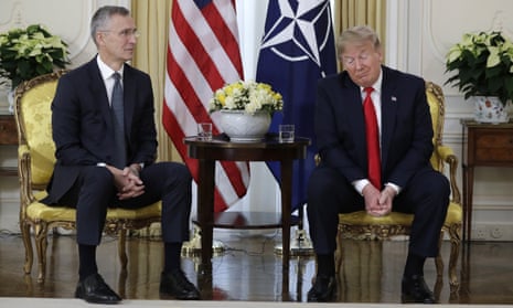 Donald Trump grimaces during a meeting with Nato’s secretary general, Jens Stoltenberg, in central London.