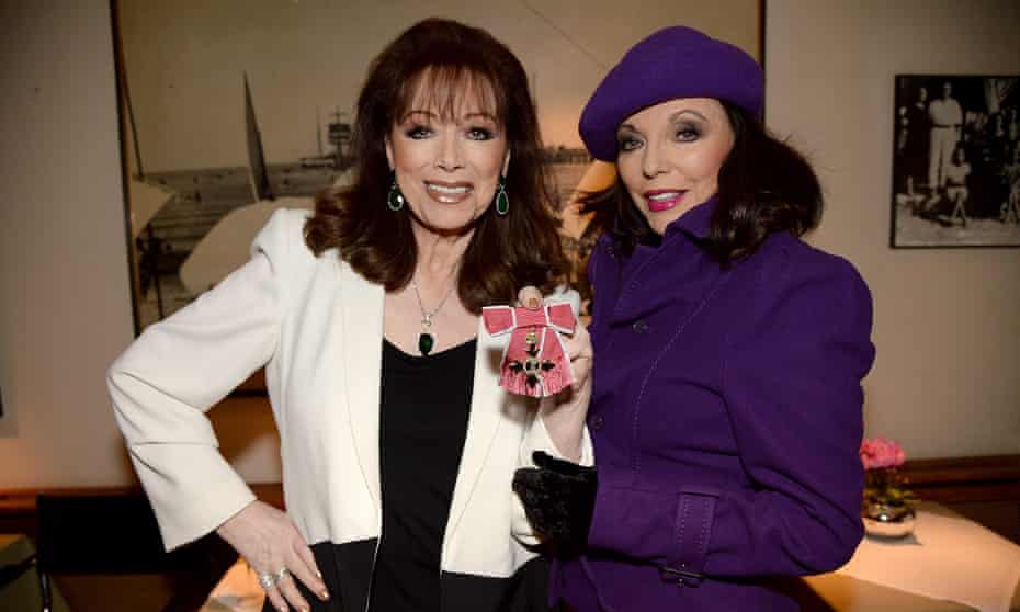 Jackie Collins, left, with sister Joan in 2013 after being awarded an OBE.