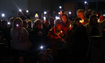 Members of the Ballarat community participate in a rally against men's violence following the alleged murder of three women in the regional Victorian city within the past three months, at Ballarat Train Station in Ballarat, Friday, April 12, 2024. (AAP Image/Con Chronis) NO ARCHIVING