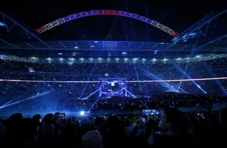 The scene as Anthony Joshua makes his ring-walk before the Anthony Joshua v Wladimir Klitschko World Heavyweight unification title fight at Wembley Stadium.