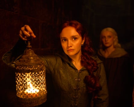 Olivia Cooke carrying a lantern in House of the Dragon