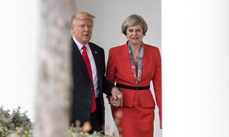 Trump and May hand in hand