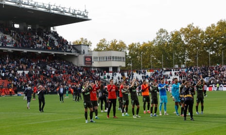 Girona's players celebrate at the end of their win over Rayo Vallecano