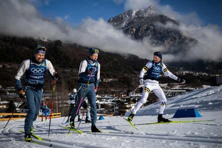 Emil Iversen and Johannes Høsflot Klæbo of Norway with Frida Karlsson of Sweden at a cross-country skiing training session