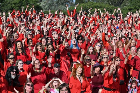 Around 500 Kate Bush fans have converged on Sydney Park dressed in their reds.