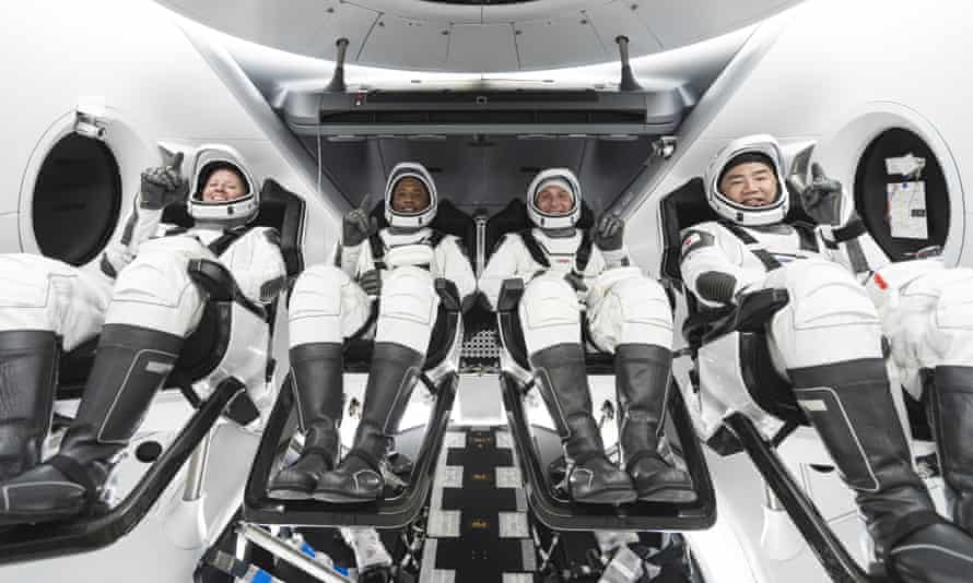 Nasa astronauts Shannon Walker, Victor Glover, commander Mike Hopkins and Japan Aerospace Exploration Agency astronaut Soichi Noguchi inside SpaceX’s Crew Dragon spacecraft