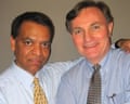 two men smile together