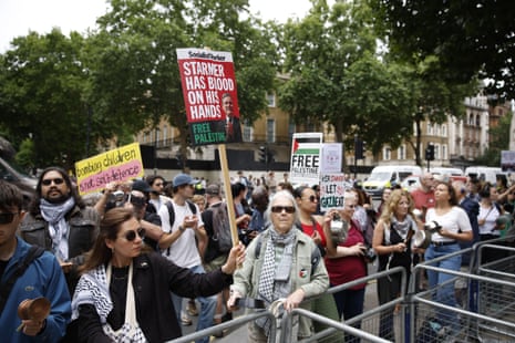 Pro-Palestine protesters outside Downing Street today.