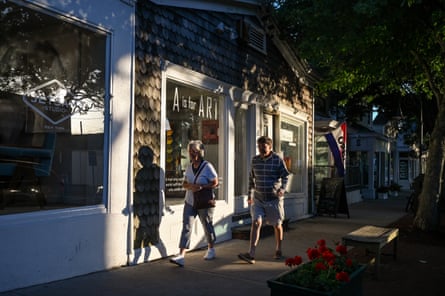 Pedestrians walk past businesses in downtown Southampton on Thursday, June 10, 2021 in Southampton, New York.