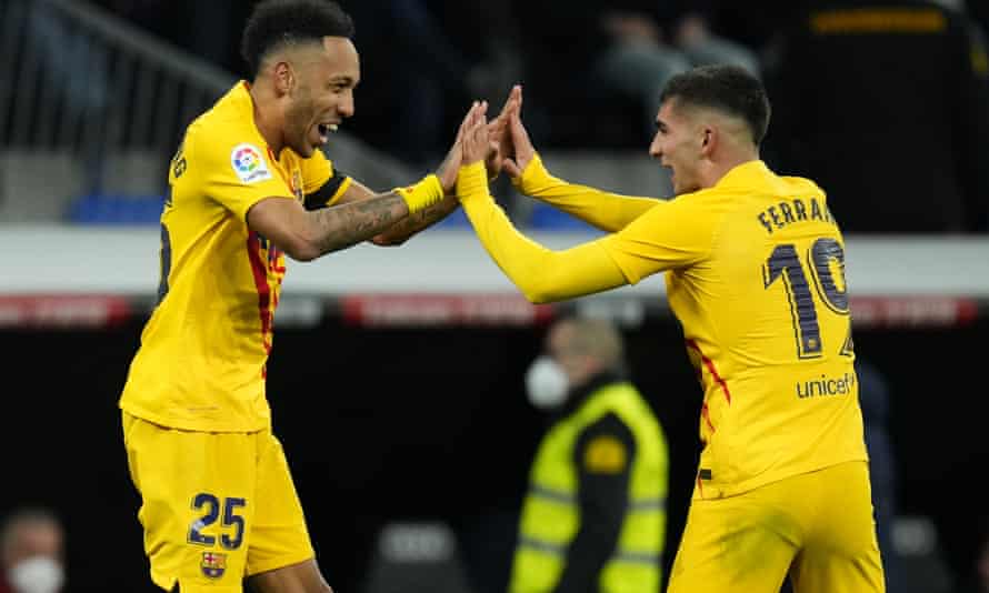 Barcelona’s Pierre-Emerick Aubameyang (left) celebrates a goal with Ferran Torres, who also scored against Real Madrid.