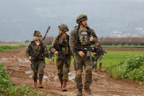 Israeli soldiers patrol an area near the northern kibbutz of Kfar Blum close to the border with Lebanon after Hezbollah said its fighters carried out an aerial attack against an Israeli air defence system site in the border region on Thursday.