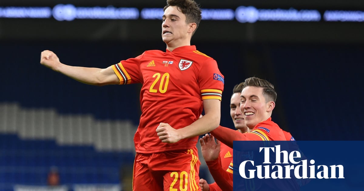 Wales climb into Nations League top tier with victory over 10-man Finland
