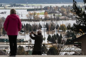 Residents look out across the flooding of Sumas Prairie near Abbotsford