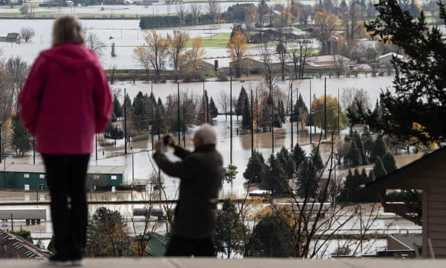 Residents of Sumas Prairie look at flooding on 16 November.