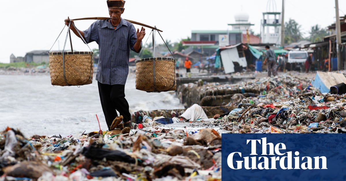 Indonesia fishing village flooded with tide of rubbish after heavy rains | Indonesia