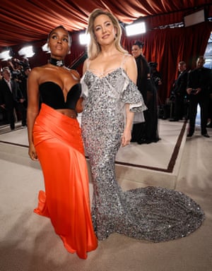 Vera Wang is known for her soft wedding gowns but tonight she spiced things up for Janelle Monáe with a tangerine cut-out look. Kate Hudson’s sequinned dress is from Rodarte, another American brand loved for its romantic dresses. 