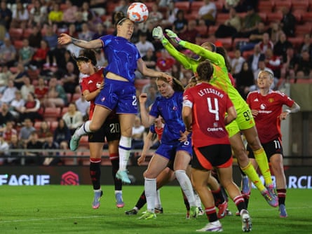 Chelsea’s Lucy Bronze heads the ball past Manchester United’s keeper Phallon Tullis-Joyce to score what proved to be the winner.