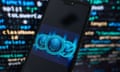 Crypto currencies logos are displayed on a smartphone with programing code on the background.
Tech illustrations in Poland - 12 Sep 2023