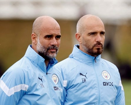 Pep Guardiola, the Manchester City manager, and his assistant Enzo Maresca watch on a training session.