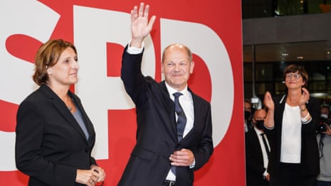 Olaf Scholz seeks three-way coalition after SPD's narrow German election win – video
