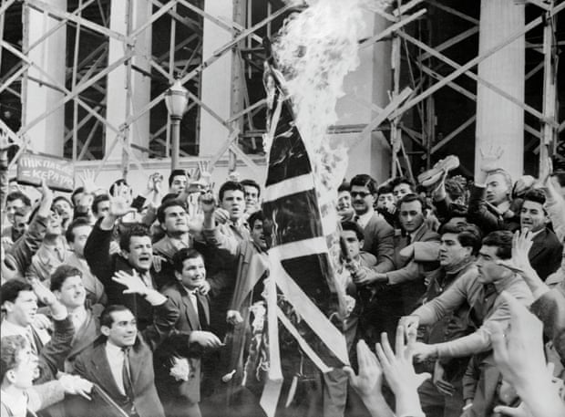 Students in Athens burn the British Union Jack during Greek-Cypriot drive for union of Cyprus with Greece.