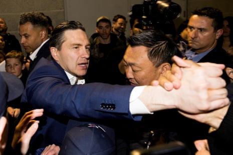 Man is mobbed by political supporters