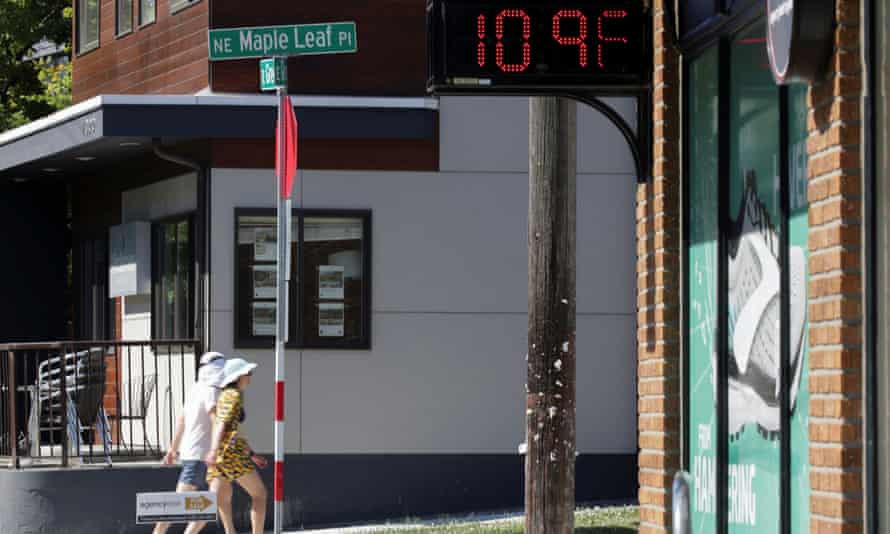 A digital sign shows a temperature of 109F in Seattle, Washington, on 28 June.