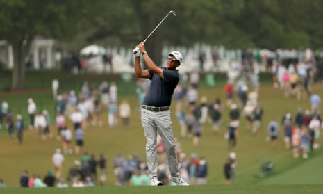 Phil Mickelson plays a shot on the first hole.