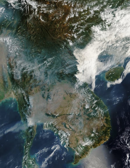 A natural-colour image showing large numbers of small fires burning throughout the Indochina peninsula