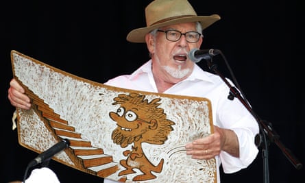 Rolf Harris performing with his wobbleboard at the Glastonbury festival, 2010.