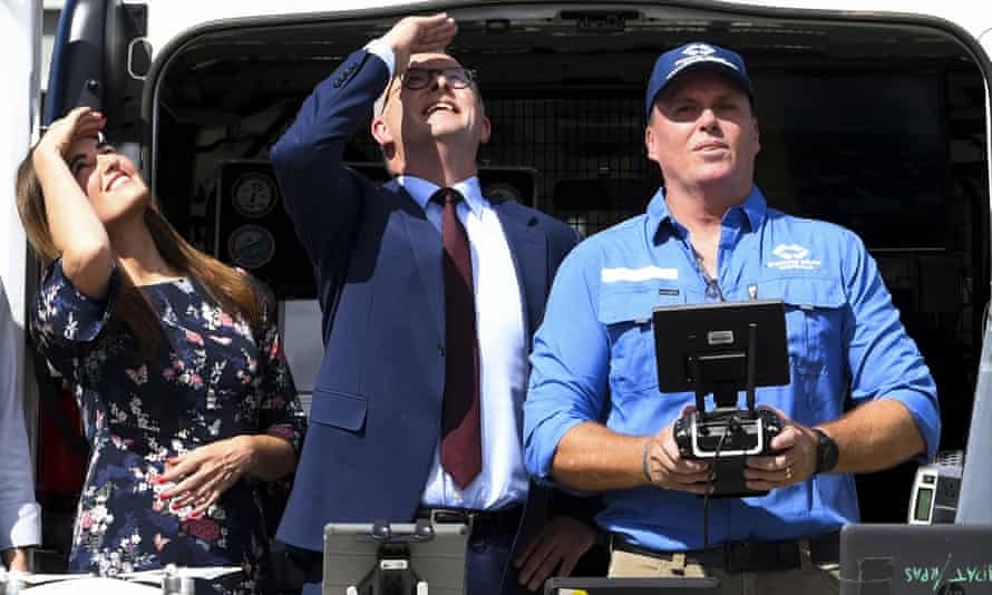 Anthony Albanese and Labor candidate for Dickson Ali France watch a drone while meeting staff from veterans’ organisation Disaster Relief Australia in Brisbane today.