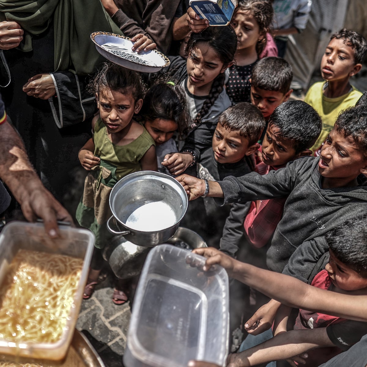It's death there': babies and children hit hardest as famine tightens hold on Gaza | Gaza | The Guardian