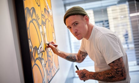 ‘I want to give people hope’ … Worley finishes another canvas.