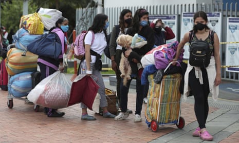 Migrants in Bogotá wait for a bus to take them to the Venezuelan border, Thursday, 2 July 2020. 