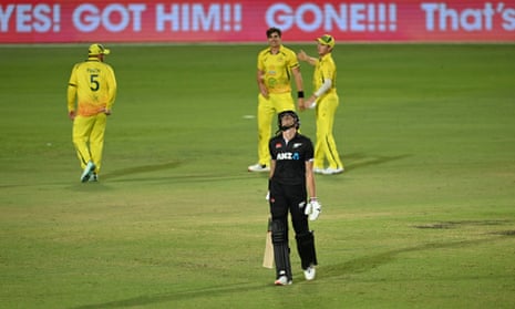 Mitchell Santner of New Zealand walks off after being dismissed in the third ODI at Cazalys Stadium in Cairns.AP