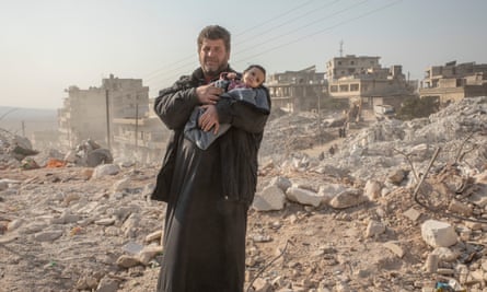 Mohammed Hadi with his baby daughter.