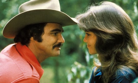 Reynolds with Sally Field in Smokey and The Bandit.