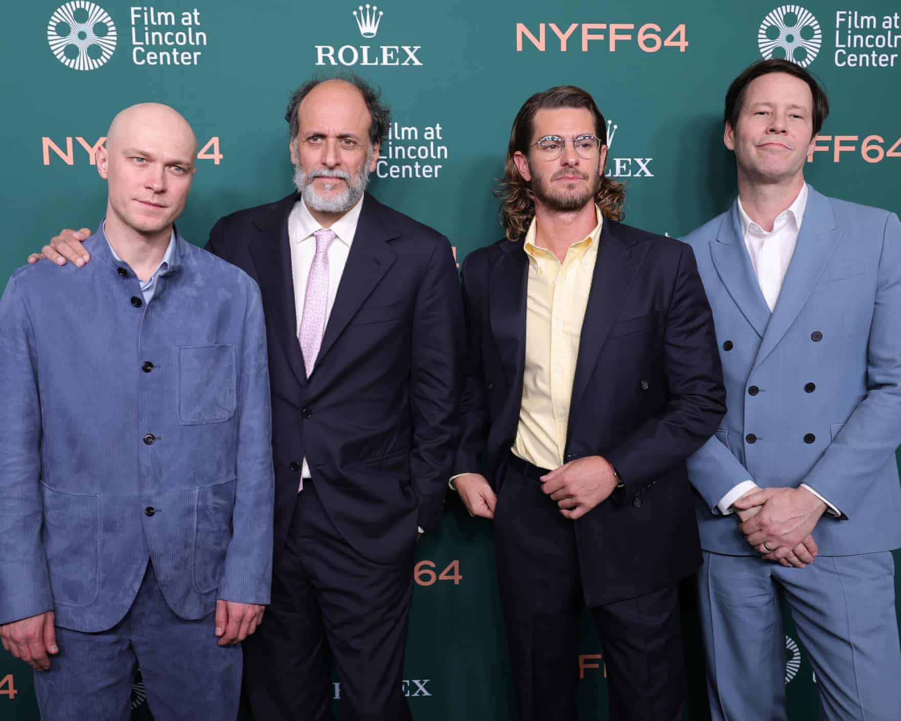 Four men in suits