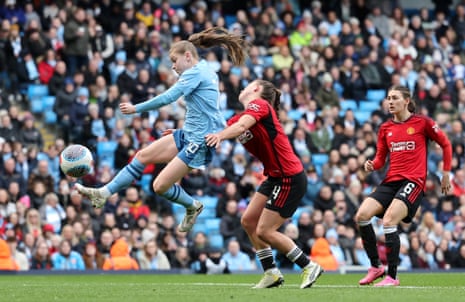 Jess Park volleys the ball past Manchester United’s keeper Mary Earps to score her, and Manchester City’s, second goal of the game.