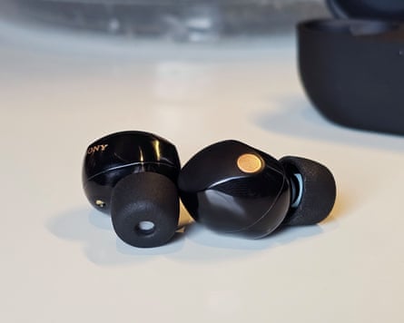 A pair of Sony WF-1000XM5 earbuds